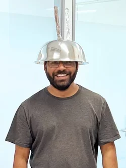 Sandeep in Halloween costume with a bowl on his head