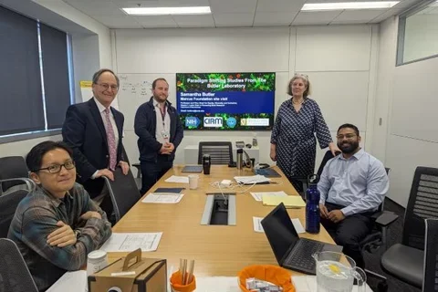 Butler lab members around conference table