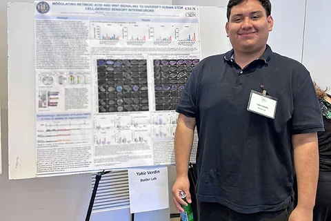 a man at a scientific poster