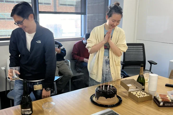 two people and a cake
