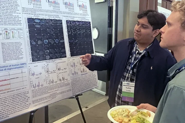 men presented a scientific poster