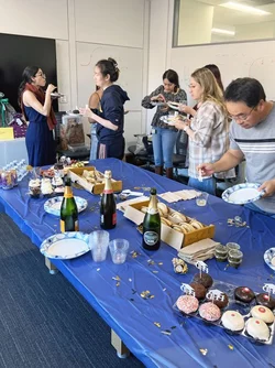 Sandy's defends her thesis party with food table